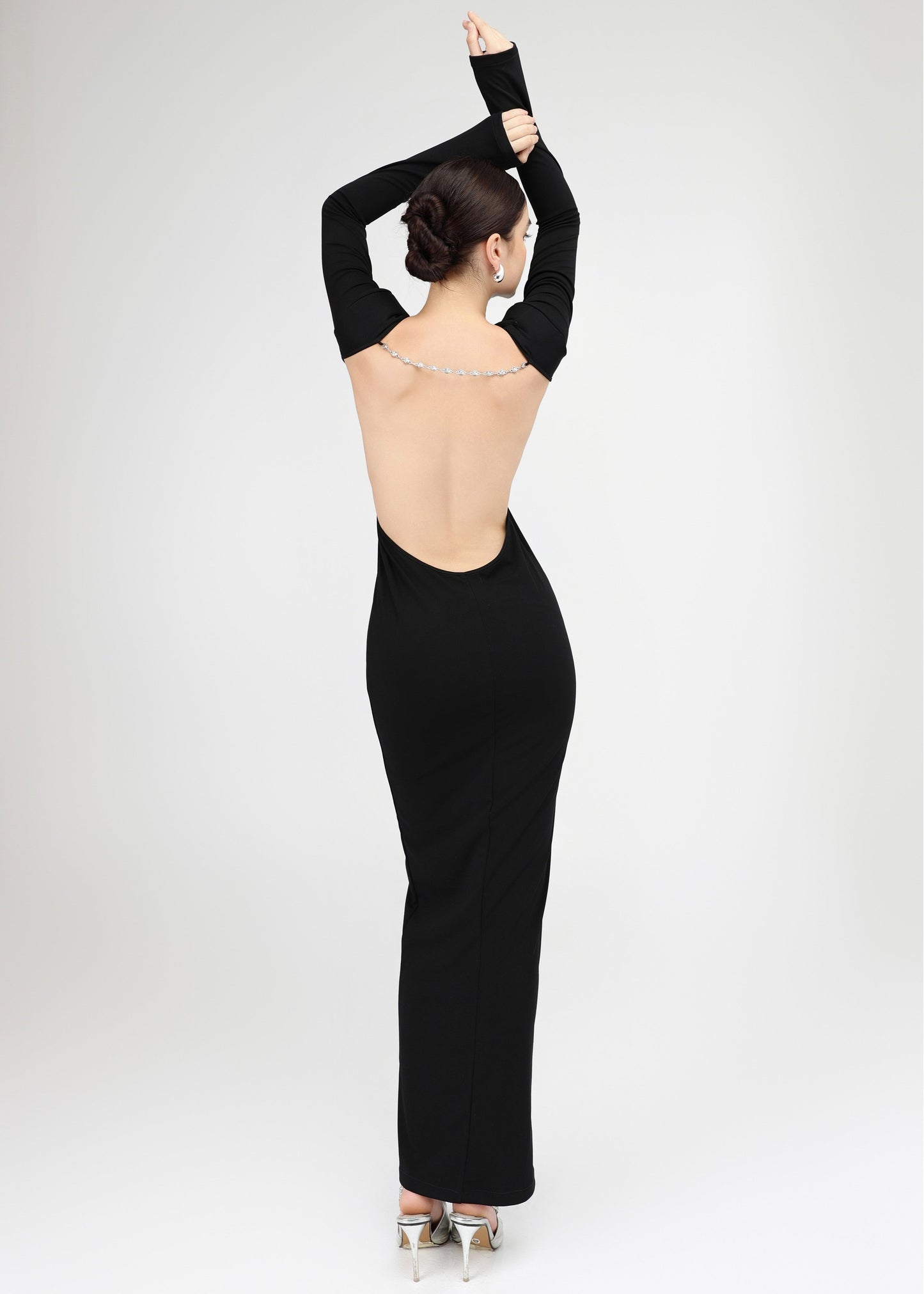 The Ritual Dress – Timeless Form-Fitting Black dress with Subtle Cutouts and Open Back